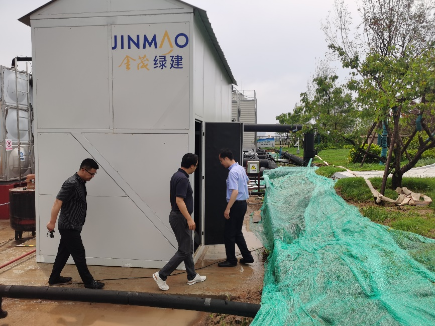 楊冰總一行蒞臨青島中歐國際城能源站熱源塔熱泵項目考察